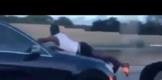 Man On Hood of Mercedes Driving I-95 in Miami