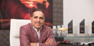 Bomnin Chevy and Bomnin Volvo Ranks #1 in Sales rnaldo Bomnin, founder of Bomnin Automotive Group poses for a picture while sitting at his desk. Photo courtesy Bomnin Auto Group.