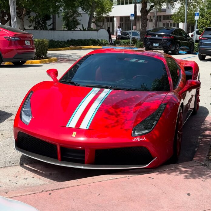 This Ferrari 488 GTB is dripping in Rosso Corsa perfection, accented by a sleek Italian tricolore racing stripe. It’s el…